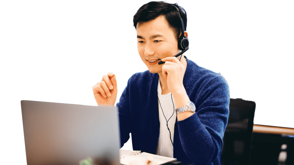 Businessman talking on his laptop wearing a headset