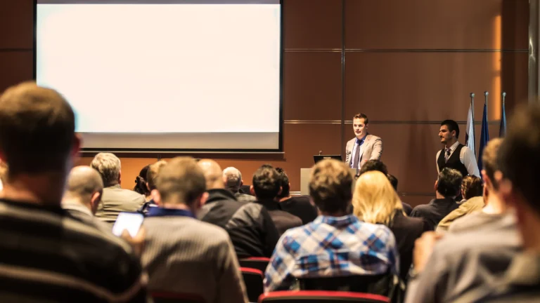 image of employees attending a company internal communications hybrid event