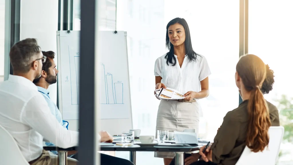 Group of co-workers determining whether they should purchase a GlobalMeet self-serve license or professionally managed events package