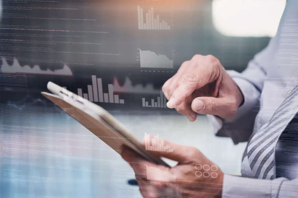 image representing a businessman holding a tables as he looks to reduce event overhead with enterprise event management software