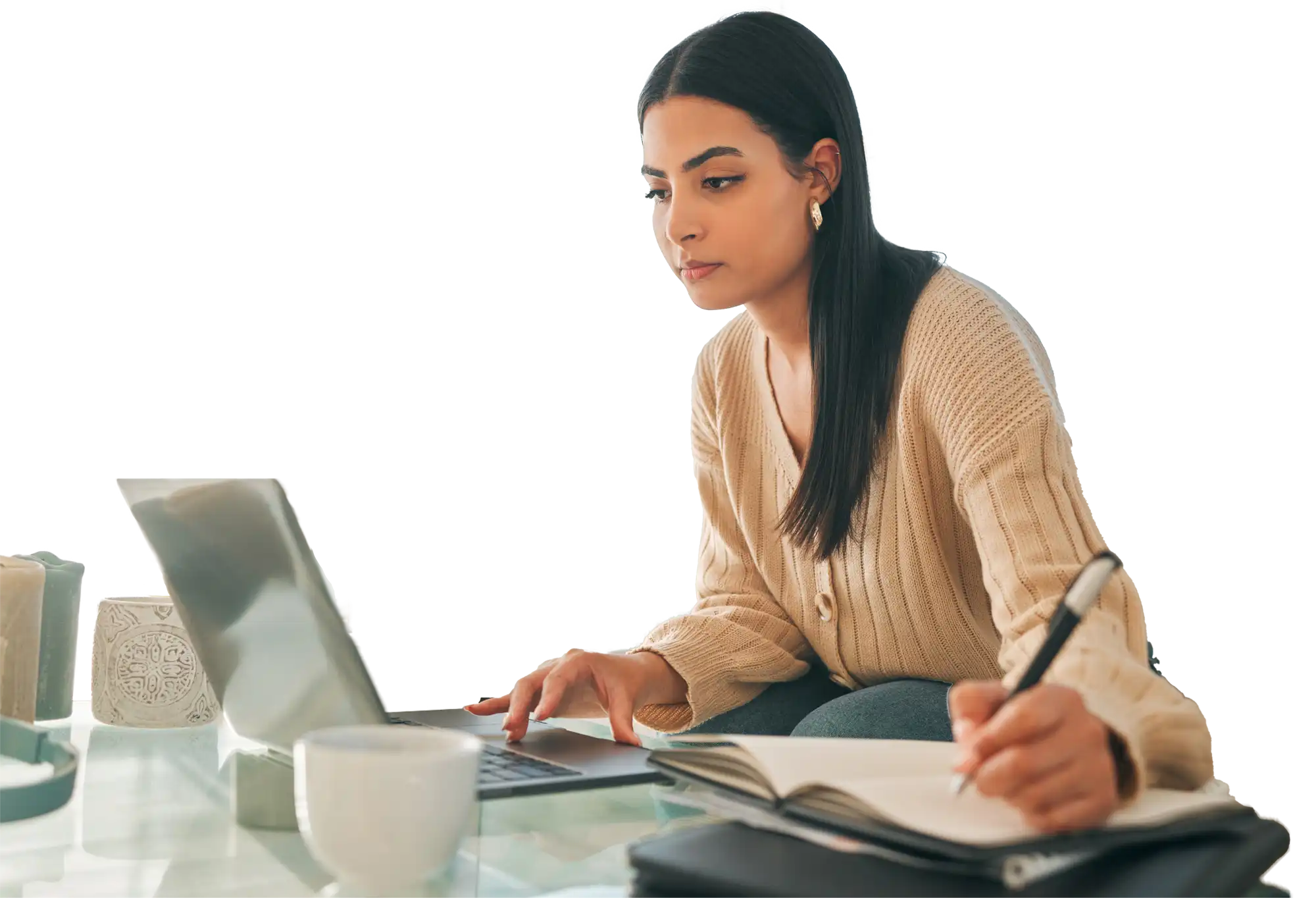 a business woman takes notes at a computer representing globalmeet's video training platform